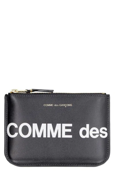 Comme Des Garçons Logo Detail Leather Pouch In Black