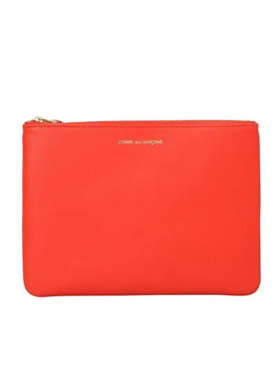Comme Des Garçons Smooth Leather Pouch In Seven Words In Orange