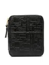 Comme Des Garçons Logo Embossed Wallet In Black