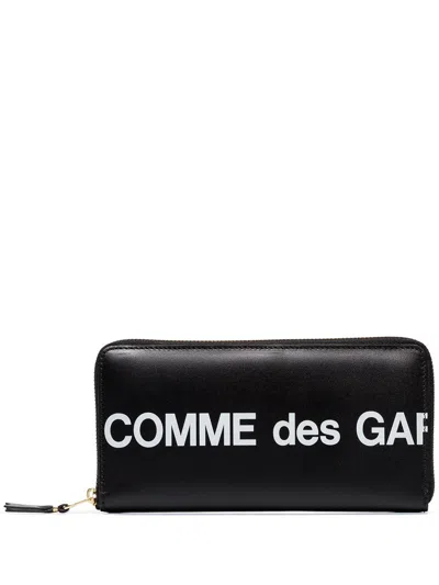 Comme Des Garçons Logo-print Continental Wallet In Black