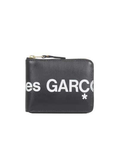 Comme Des Garçons Logo-print Zipped Bi-fold Wallet In Black