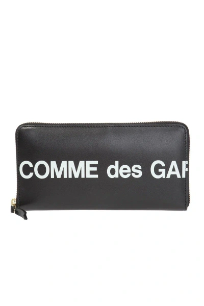 Comme Des Garçons Logo Printed Zipped Wallet In Black