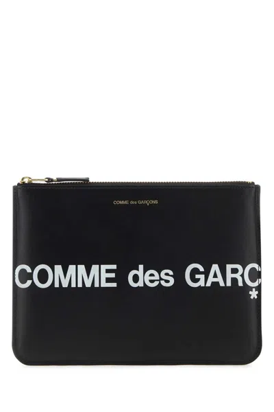 Comme Des Garçons Logo-print Leather Clutch In Black