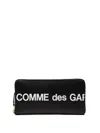 Comme Des Garçons Rectangular Wallet Featuring Huge Logo