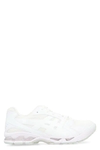 COMME DES GARÇONS COMME DES GARÇONS LOW-TOP SNEAKERS MADE OF LEATHER AND FABRIC.