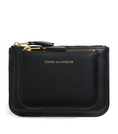 Comme Des Garçons Medium Leather Logo Wallet In Black