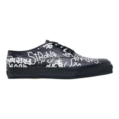 COMME DES GARÇONS MESSAGE PRINTED LEATHER VULCANIZED SNEAKERS