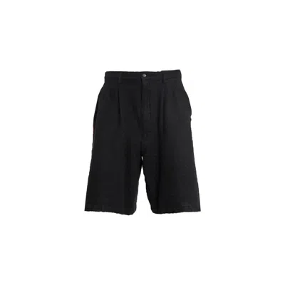 Comme Des Garçons Pinstripe Pleated Shorts In Black
