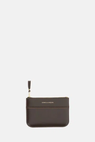 COMME DES GARÇONS PLAY WALLETS