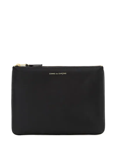 Comme Des Garçons Play Zip Logo Leather Clutch In Pattern