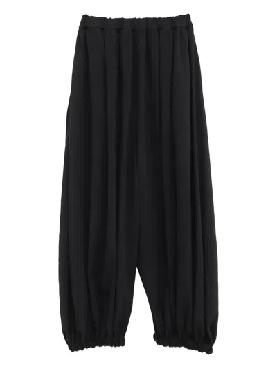 Comme Des Garçons Pleated Balloon Trousers In Black