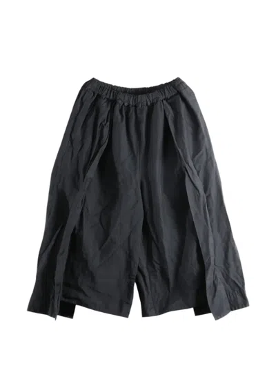 Comme Des Garçons Pleated Cropped Trousers In Black
