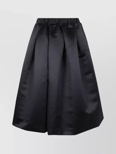 COMME DES GARÇONS PLEATED SATIN FINISH MIDI LENGTH SKIRT