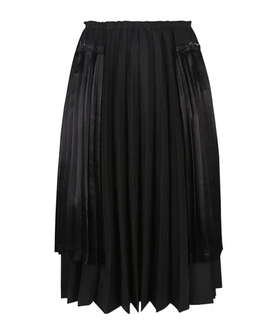 COMME DES GARÇONS PLEATED SKIRT