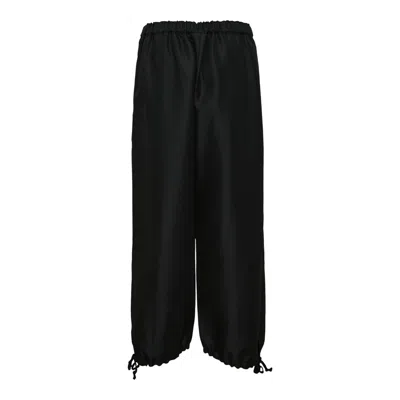 Comme Des Garçons Polyester Elastic Hem Pants In Black