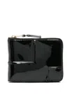 Comme Des Garçons Reversed Hem Leather Wallet In Black