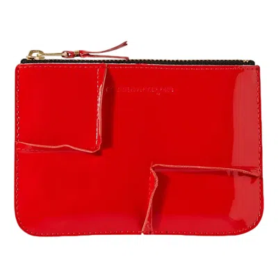 Comme Des Garçons Reversed Hem Small Pouch In Red