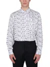 Comme Des Garçons Shirt X Kaws Print E Shirt In White In White