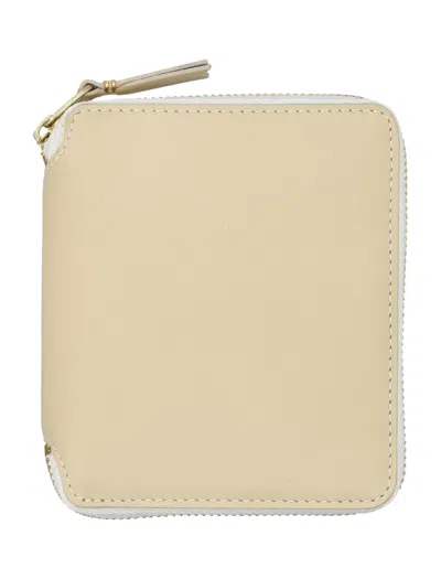 Comme Des Garçons Smooth Leather Vertical Zip Around Wallet In Beige