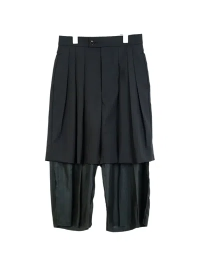 Comme Des Garçons Tao Pleated Trousers In Black