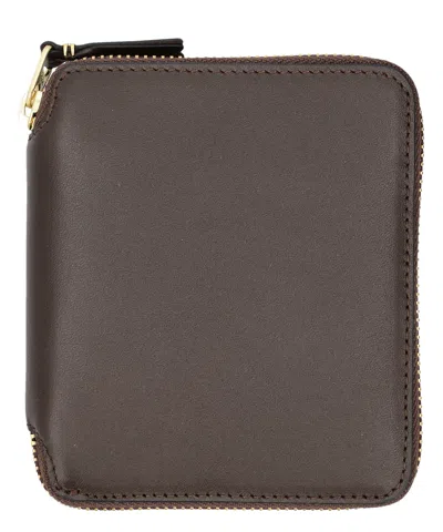 Comme Des Garçons Vertical Zip Around Wallet In Brown