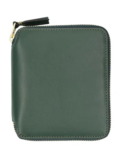 Comme Des Garçons Vertical Zip Around Wallet In Green