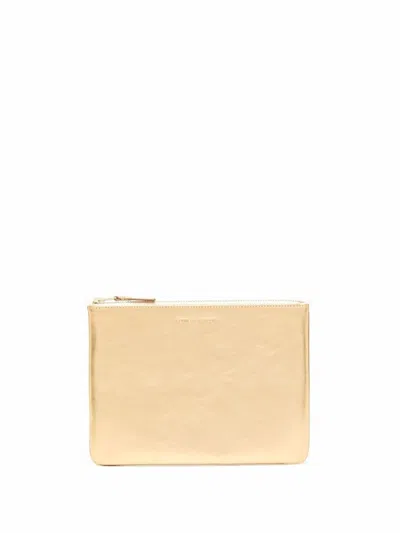 Comme Des Garçons Wallet Bags In Gold