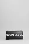 Comme Des Garçons Leather Pouch With Logo Print In Black