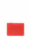 Comme Des Garçons Smooth Leather Pouch In Seven Words In Oran Orange