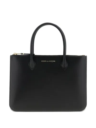 Comme Des Garçons Wallet Handles In Black