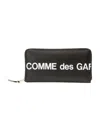 Comme Des Garçons Continental Wallet With Bold Logo Print In Black