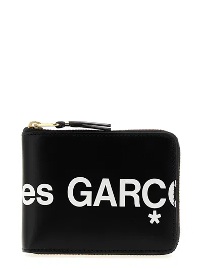 Comme Des Garçons Logo-print Zipped Bi-fold Wallet In Black