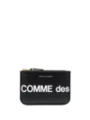 Comme Des Garçons Wallet Logo Printed Zipped Clutch Bag In Black