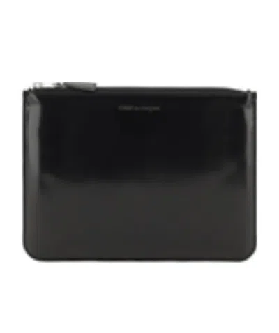 Comme Des Garçons Wallet Logo Embossed Zipped Pouch