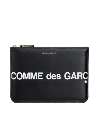 COMME DES GARÇONS COMME DES GARÇONS WALLET MEDIUM LOGO LEATHER POUCH