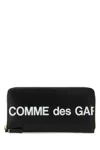 Comme Des Garçons Wallet Medium Logo Leather Pouch In Black