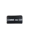 Comme Des Garçons Leather Pouch With Logo Print In Black