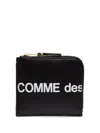 Comme Des Garçons Leather Pouch With Logo Print In Black