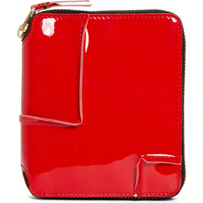 Comme Des Garçons Reversed Hem Patent Zip Around Wallet In Red