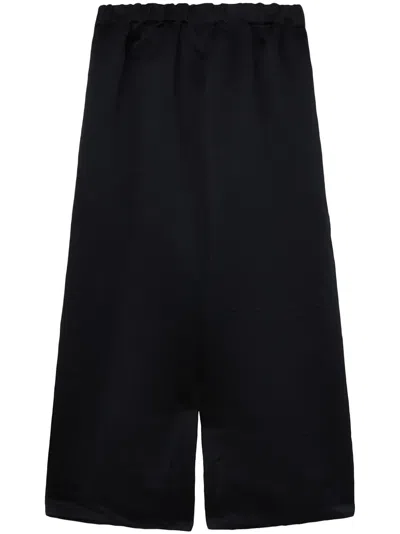 COMME DES GARÇONS WIDE-LEG CROPPED TROUSERS