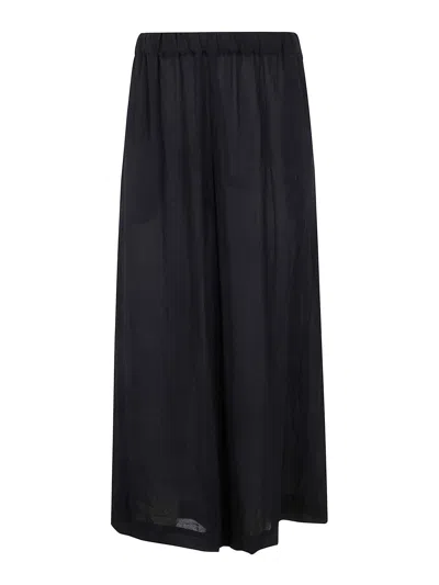 COMME DES GARÇONS WOMAN TROUSERS