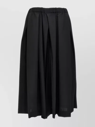 COMME DES GARÇONS WOOL PLEATED WIDE LEG TROUSERS