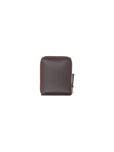 Comme Des Garçons Zip Logo Wallet In Brown