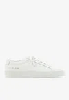 Common Projects Minimalist White Leather Sneakers With Embossed Detail In Animal Print