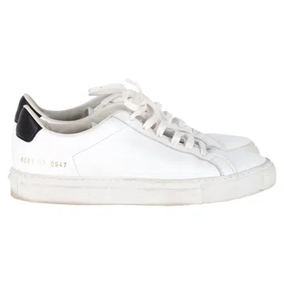 COMMON PROJECTS ACHILLES LOW-TOP SNEAKERS IN WHITE LEATHER