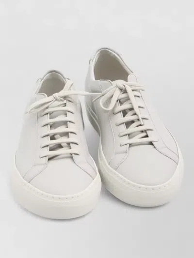 COMMON PROJECTS LEATHER LOW-TOP SNEAKERS