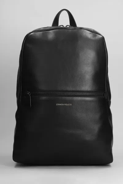 Common Projects Logo-print Leather Backpack In Black