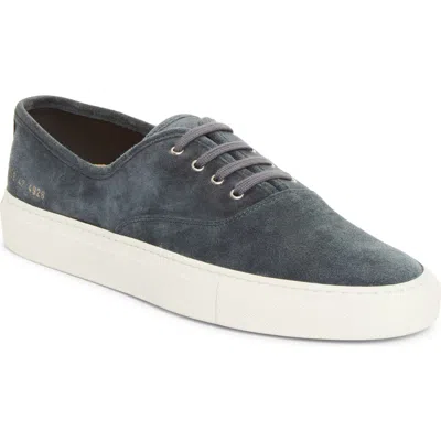 Common Projects Four Hole Suede Sneaker In Navy