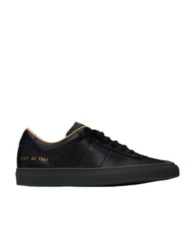 Common Projects Front Strapped Low-top Casual Shoes In Black