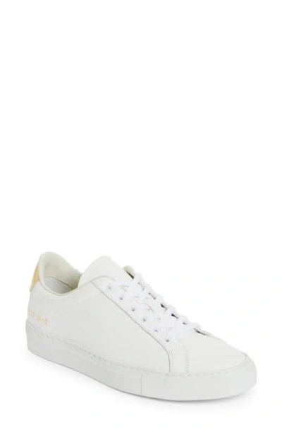 Common Projects Retro Classic Low Top Trainer In Gold Metallic